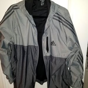 Grey/black windbreaker with hood